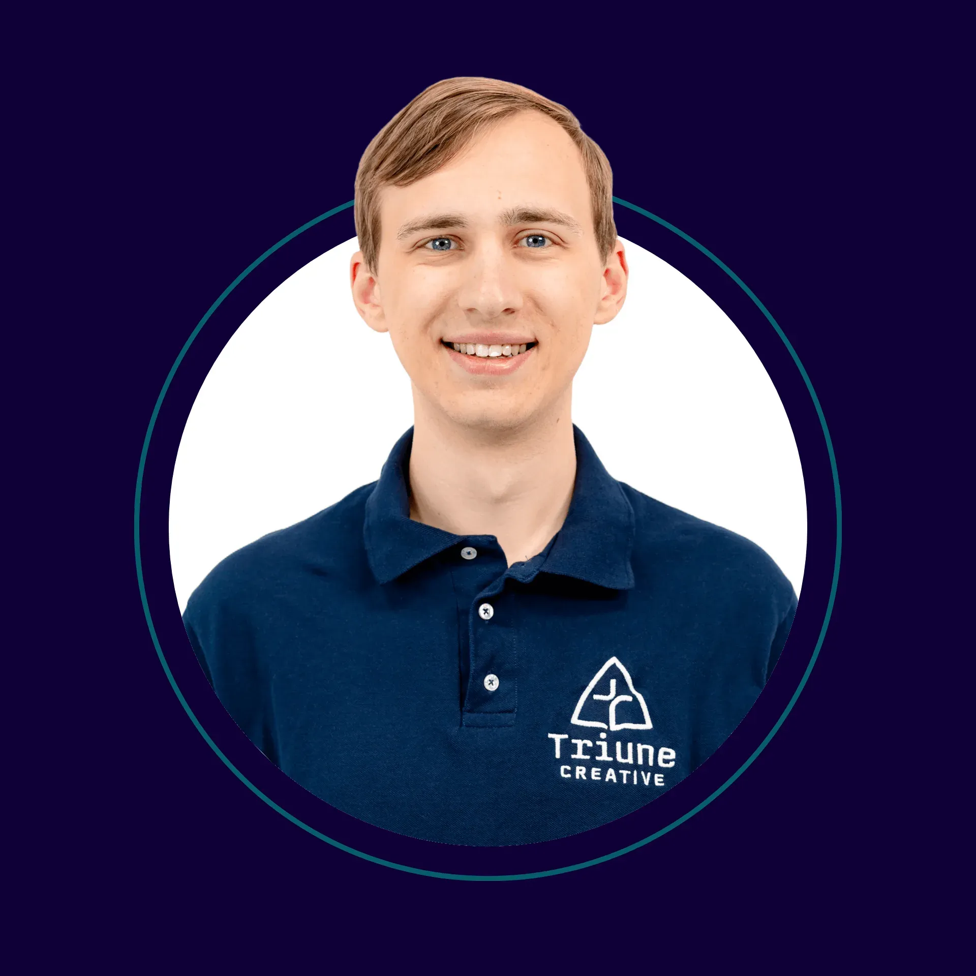 A young man with light brown hair and blue eyes is smiling, wearing a navy blue polo shirt with a Triune Creative logo, against a white background with a navy blue border.
